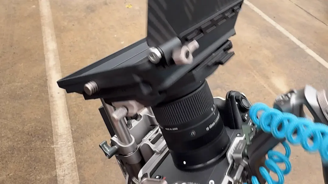 Cinema camera with a matte box rigged up on location for a shoot